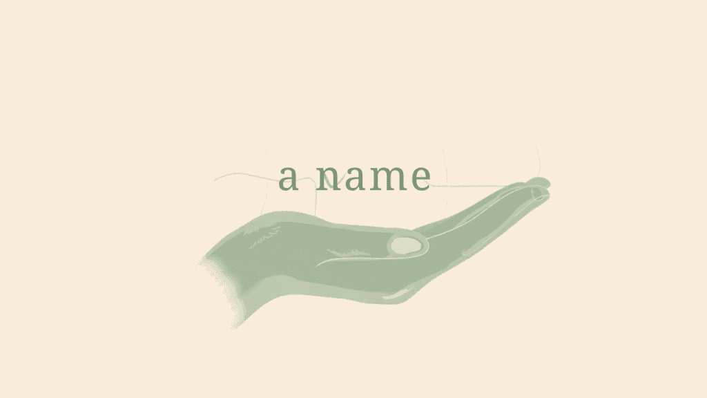 Open hand with birth name letters—illustration of soul urge number calculation from vowels in numerology."